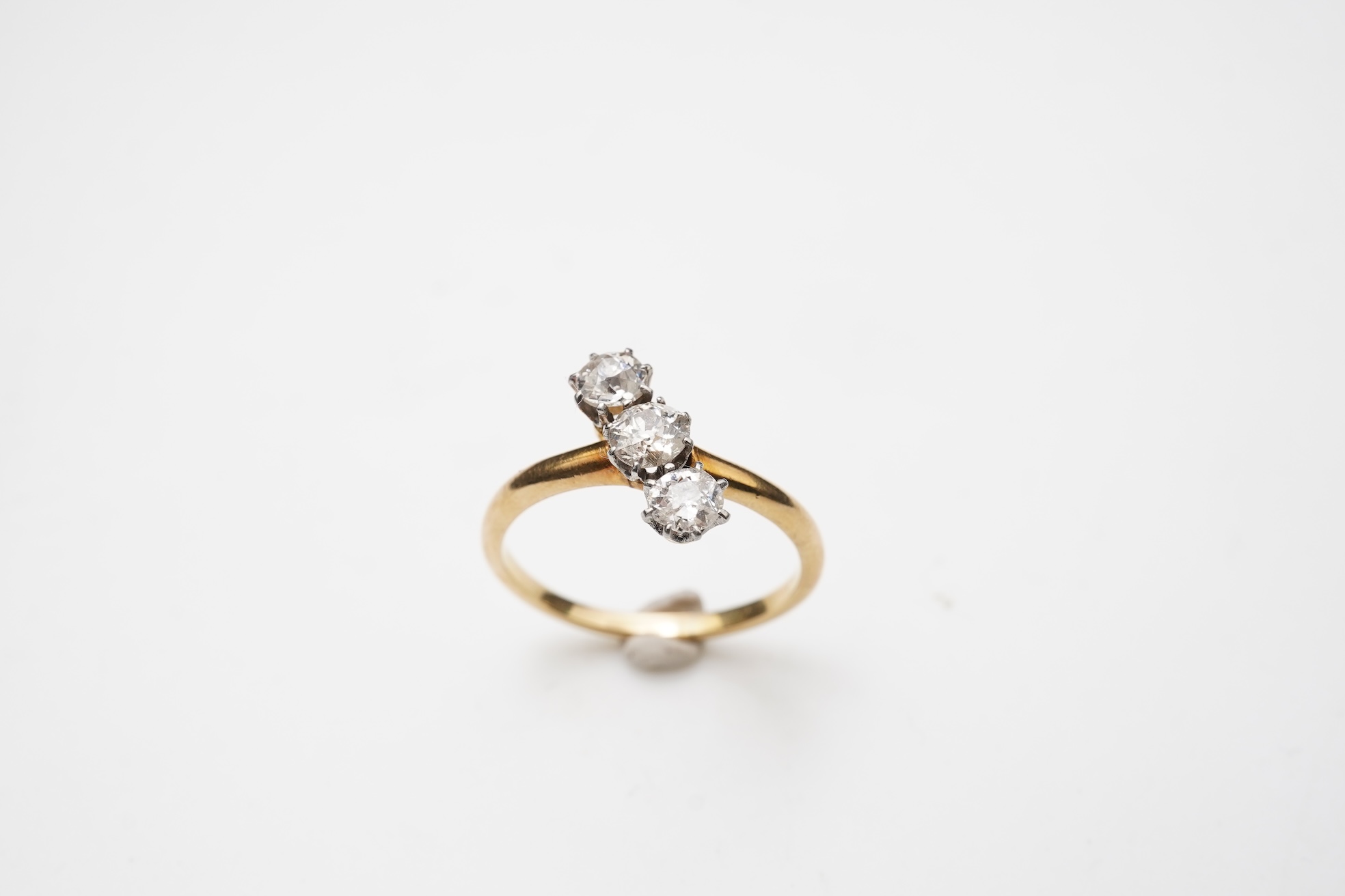 A diamond three-stone ring, early 20th century